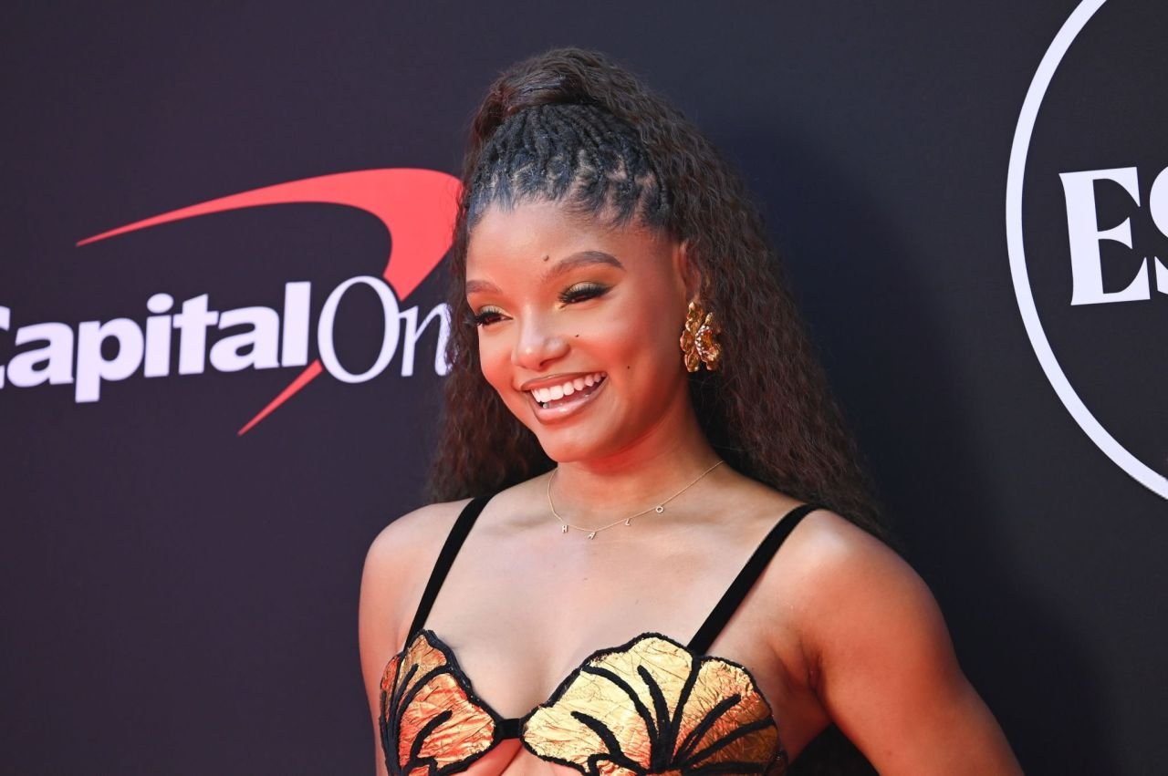 In recent years, few young stars have captured the world’s attention quite like Halle Bailey. From her roots in music to her breakout role as Disney royalty, Halle has become a symbol of talent, grace, and change in the entertainment industry. Today, her name is not just trending—it’s shaping the future of Hollywood. From Chloe x Halle to Center Stage Halle Bailey first rose to fame as one-half of the Grammy-nominated R&B duo Chloe x Halle, alongside her sister Chloe Bailey. Discovered by Beyoncé through their viral YouTube covers, the sisters were signed to her label, Parkwood Entertainment, and quickly gained a loyal following. Their 2020 album “Ungodly Hour” was critically acclaimed, showcasing their ethereal vocals, bold production, and lyrical maturity. While the duo continues to be celebrated for their artistry, Halle has recently taken center stage as a solo performer and actress, proving she’s a force in her own right. Making Waves as Ariel in "The Little Mermaid" Halle Bailey made headlines worldwide when she was cast as Ariel in Disney’s live-action adaptation of “The Little Mermaid.” The announcement sparked excitement—and controversy—due to the casting of a Black actress in the traditionally white, red-haired role. But once the trailer dropped and Halle’s voice soared through a haunting rendition of “Part of Your World,” any doubts were silenced. Released in 2023, the film was a box office hit and marked a turning point in representation in family entertainment. Halle’s performance was praised for its emotional depth, powerful vocals, and natural charm. She brought a fresh, modern perspective to a classic character, inspiring a new generation of children who finally saw a Disney princess who looked like them. A Symbol of Representation and Progress Halle Bailey’s casting as Ariel was more than just a role—it became a cultural moment. Across social media, videos of young Black girls joyfully reacting to her performance went viral. For many, it was a reminder of how powerful representation can be in shaping self-image and confidence. In interviews, Halle has spoken openly about the pressure and pride of carrying such responsibility. “I want children to know they’re beautiful no matter what they look like,” she shared. “And they deserve to see themselves in stories.” Expanding Horizons: Music, Acting, and More While “The Little Mermaid” catapulted Halle to global stardom, she isn’t slowing down. She’s continued to explore acting, with upcoming roles in films like “The Color Purple” musical remake, where she plays the young version of Nettie. She’s also hinted at a solo music project, giving fans hope that her distinctive voice will grace more stages and soundtracks soon. Halle’s unique blend of musicality, poise, and authenticity sets her apart in an industry that often values flash over substance. Whether she’s performing live, acting on screen, or using her platform to uplift others, Halle Bailey carries herself with quiet confidence and creative courage. A New Era of Stardom In a world where celebrity often comes with scandal or controversy, Halle Bailey represents something refreshing: a young artist focused on craft, kindness, and cultural impact. Her journey from viral covers to Disney icon to a rising Hollywood star is more than impressive—it’s inspirational. As she continues to evolve as an artist, performer, and role model, it’s clear that Halle Bailey’s star is only getting brighter. Her story is still unfolding, but one thing is certain: she’s not just part of the world—she’s creating a whole new one.
