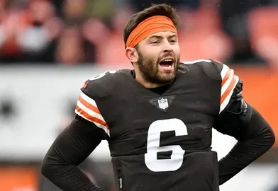 Baker Mayfield is a professional American football quarterback known for his strong arm, leadership skills, and competitive spirit.